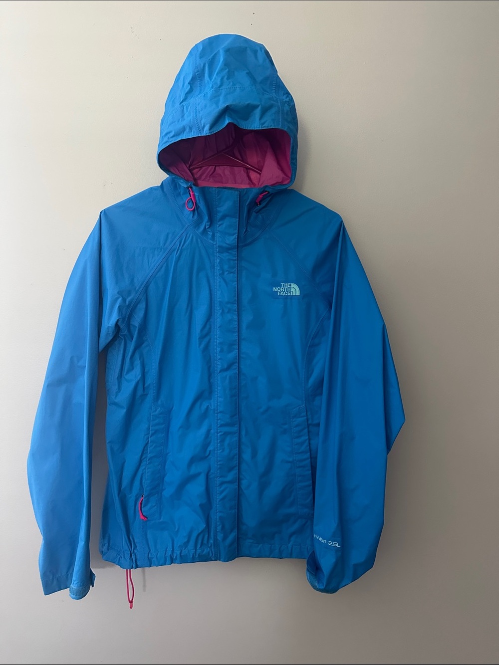 The North Face Women’s Bright Blue Rain Jacket with Pink Lining